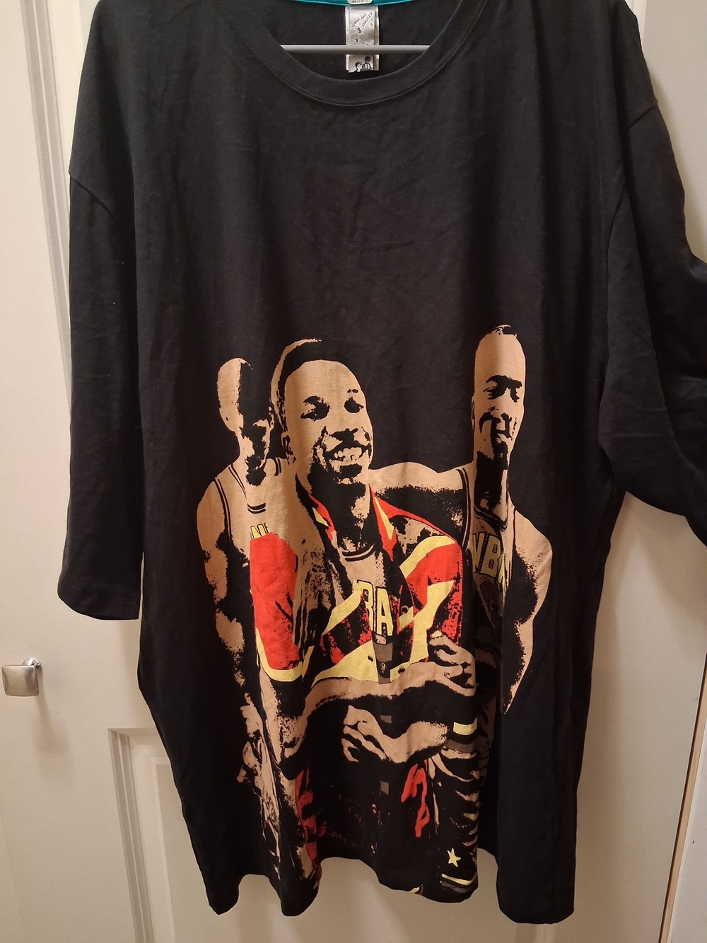 NBA Black Long-Sleeve Graphic Basketball Tee with Red and Gold Accents